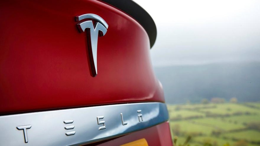 股价盘后大涨超12% 特斯拉Q3盈利超预期 马斯克：明年销量有望增加两到三成